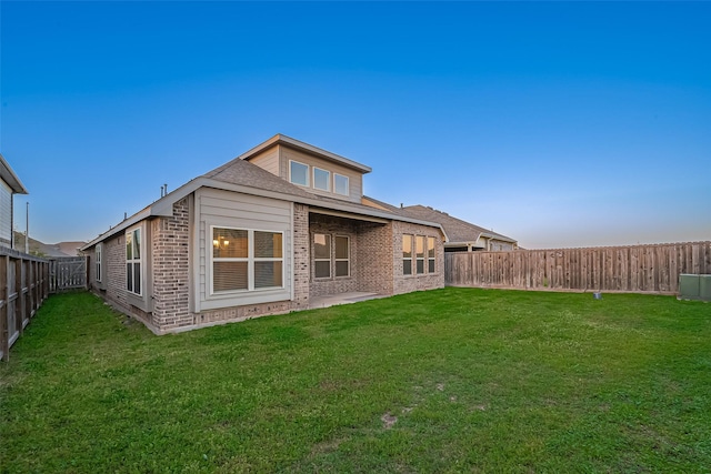 1111 Teamriddle Way, Richmond, TX 77406 - rear view of house featuring brick siding and a fenced backyard