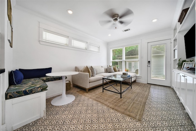 604 E 10th 1/2 St, Houston, TX 77008 - living room with ceiling fan, crown molding, tile patterned floors, and recessed lighting