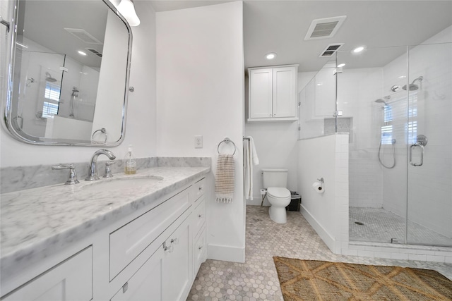 604 E 10th 1/2 St, Houston, TX 77008 - full bath with vanity, a shower stall, tile patterned floors, recessed lighting, and plenty of natural light