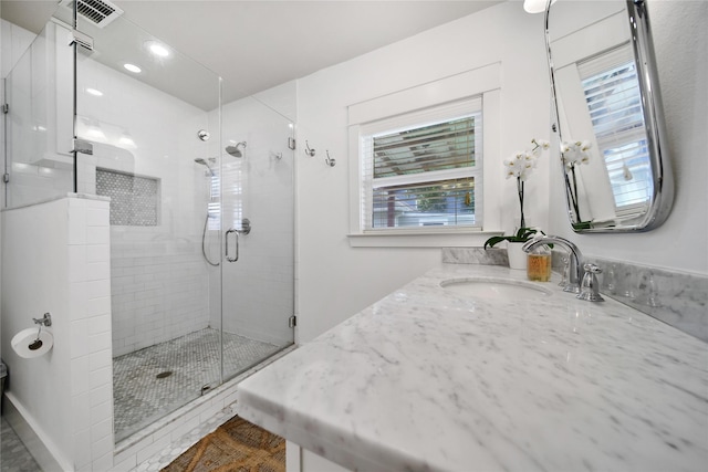 604 E 10th 1/2 St, Houston, TX 77008 - bathroom featuring a shower stall, plenty of natural light, vanity, and recessed lighting