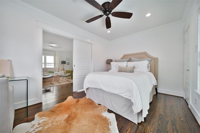 604 E 10th 1/2 St, Houston, TX 77008 - bedroom with ornamental molding, wood finished floors, recessed lighting, and a ceiling fan