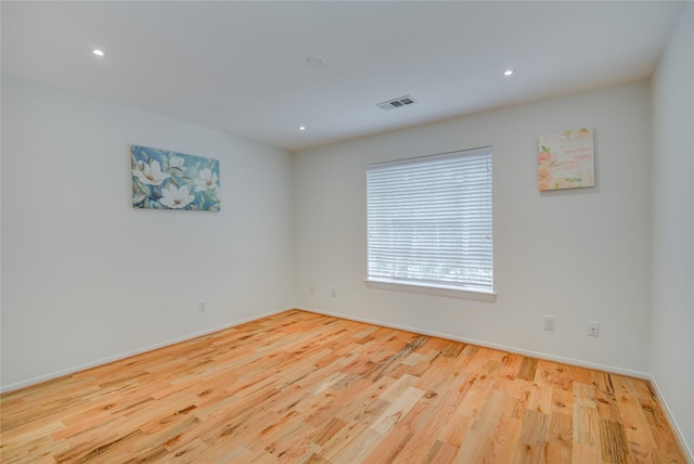 4400 Edith St, Bellaire, TX 77401 - unfurnished room featuring wood finished floors and recessed lighting