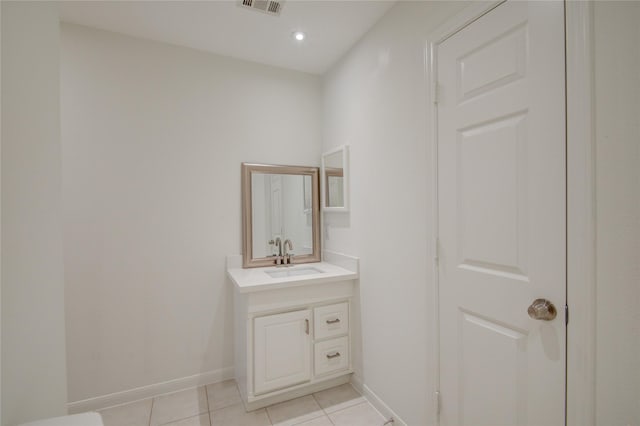 4400 Edith St, Bellaire, TX 77401 - bathroom featuring vanity, tile patterned flooring, and recessed lighting