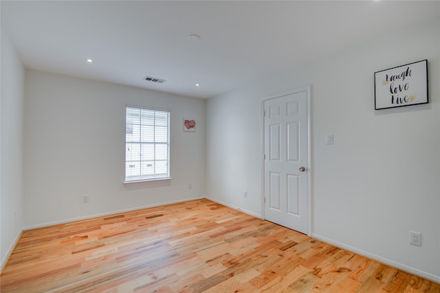 4400 Edith St, Bellaire, TX 77401 - unfurnished room featuring wood finished floors and recessed lighting