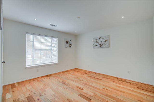 4400 Edith St, Bellaire, TX 77401 - unfurnished room featuring wood finished floors and recessed lighting