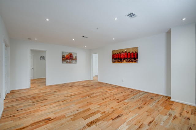 4400 Edith St, Bellaire, TX 77401 - empty room featuring light wood-type flooring and recessed lighting
