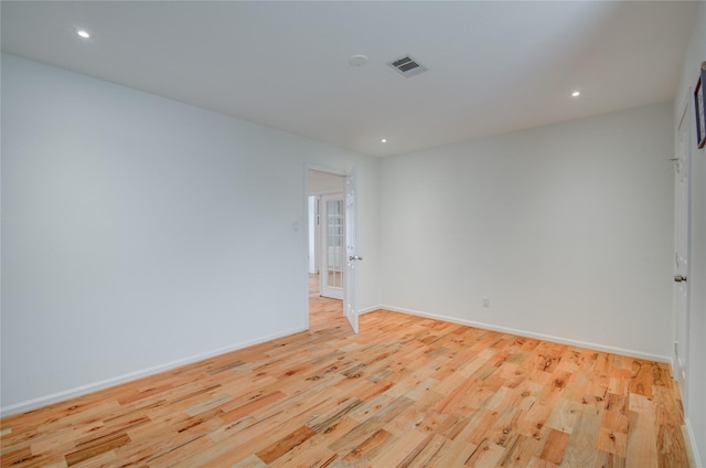 4400 Edith St, Bellaire, TX 77401 - unfurnished room with light wood-style floors and recessed lighting