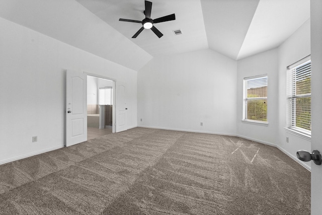 22303 Mosshall Ct, Tomball, TX 77375 - unfurnished bedroom featuring carpet floors, multiple windows, lofted ceiling, and ensuite bathroom