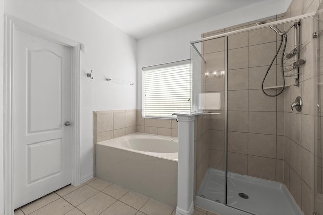 22303 Mosshall Ct, Tomball, TX 77375 - bathroom with a garden tub, tile patterned flooring, and a stall shower