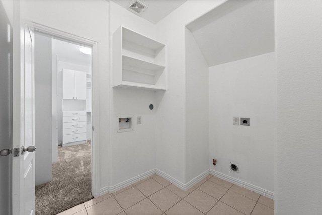 22303 Mosshall Ct, Tomball, TX 77375 - laundry room featuring hookup for an electric dryer, washer hookup, and light tile patterned flooring