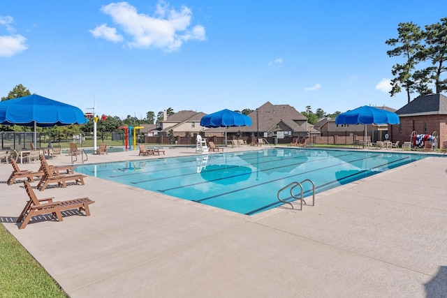 22303 Mosshall Ct, Tomball, TX 77375 - community pool with a patio area