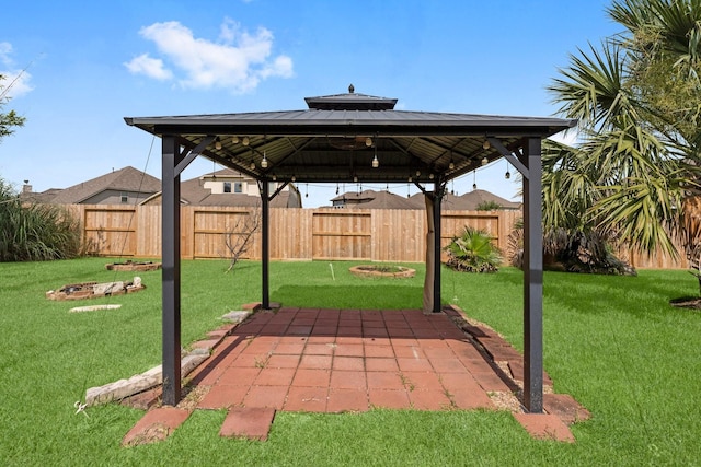 22303 Mosshall Ct, Tomball, TX 77375 - fenced backyard featuring a gazebo and a patio area
