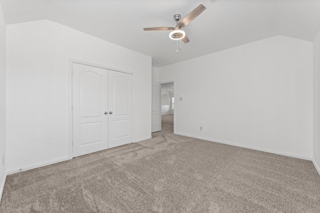 22303 Mosshall Ct, Tomball, TX 77375 - unfurnished bedroom with vaulted ceiling, carpet, a closet, and a ceiling fan