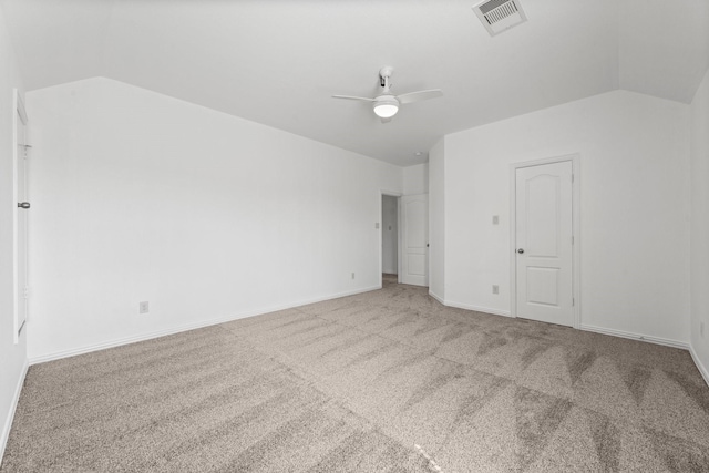 22303 Mosshall Ct, Tomball, TX 77375 - spare room featuring carpet, lofted ceiling, and ceiling fan
