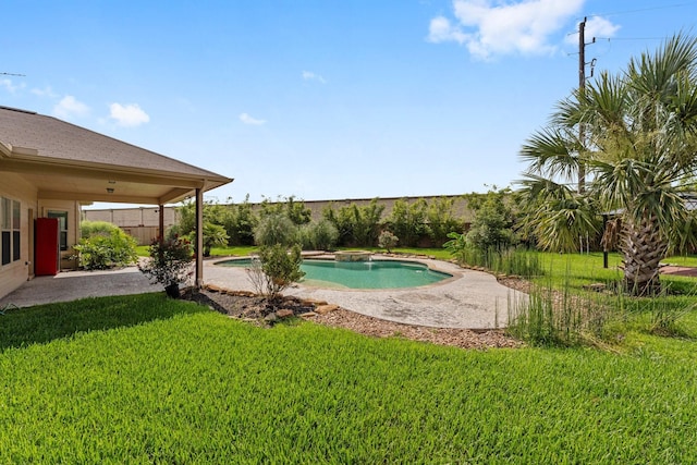 22303 Mosshall Ct, Tomball, TX 77375 - view of swimming pool featuring a lawn and a patio area