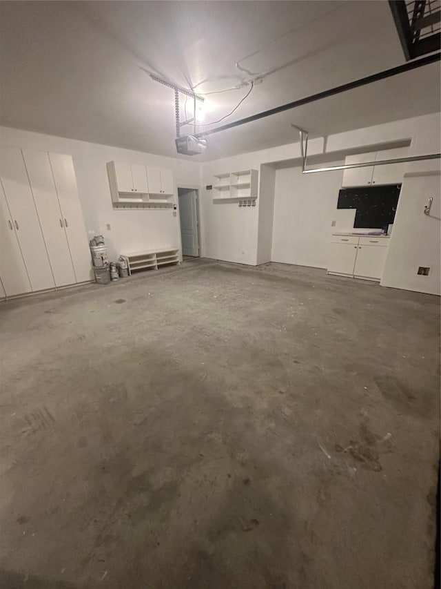 22303 Mosshall Ct, Tomball, TX 77375 - garage featuring a garage door opener