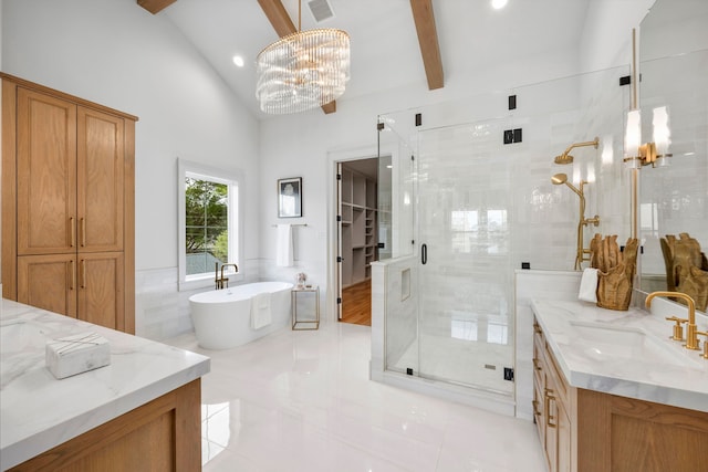 4902 Oak Forest Dr, Houston, TX 77018 - bathroom with a chandelier, a shower stall, vanity, tile patterned floors, and a soaking tub