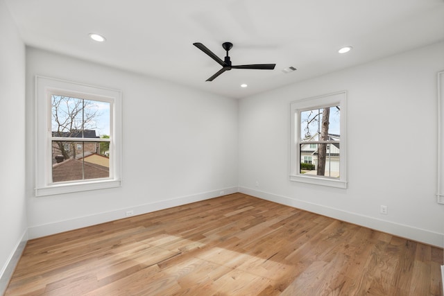 4902 Oak Forest Dr, Houston, TX 77018 - empty room with plenty of natural light, light wood-type flooring, recessed lighting, and a ceiling fan
