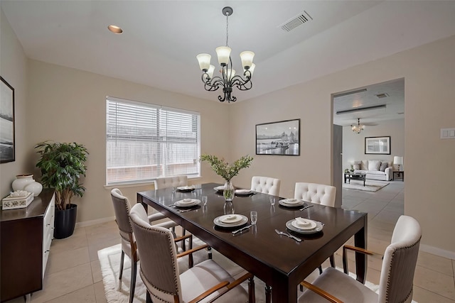 21319 Park Mill Dr, Katy, TX 77450 - dining room with a chandelier and light tile patterned flooring