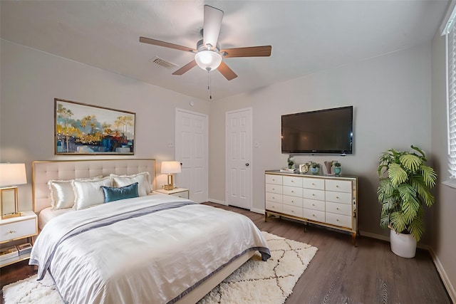 21319 Park Mill Dr, Katy, TX 77450 - bedroom with wood finished floors and a ceiling fan