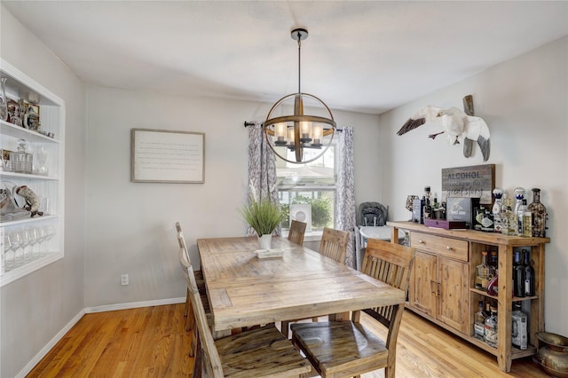 1522 Glen Oaks St, Houston, TX 77008 - dining room with light wood finished floors and a chandelier