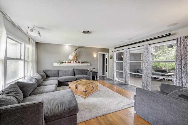 1522 Glen Oaks St, Houston, TX 77008 - living room featuring wood finished floors