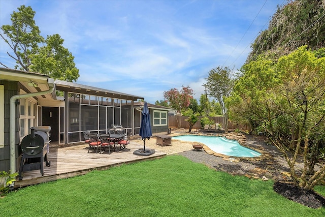 1522 Glen Oaks St, Houston, TX 77008 - fenced backyard featuring a deck and a sunroom