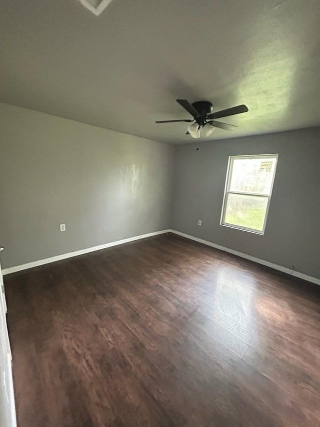 1108 Niagara St, Houston, TX 77051 - empty room with dark wood finished floors and a ceiling fan