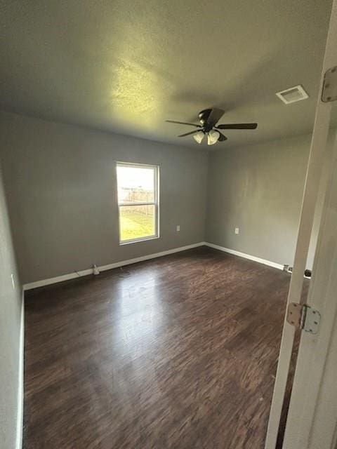 1108 Niagara St, Houston, TX 77051 - empty room with ceiling fan and dark wood finished floors