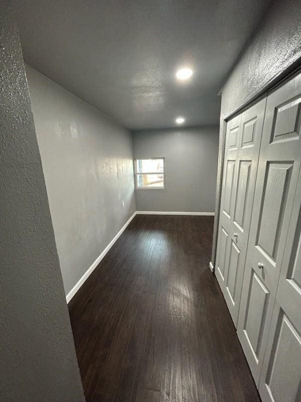 1108 Niagara St, Houston, TX 77051 - empty room featuring dark wood-style floors and recessed lighting