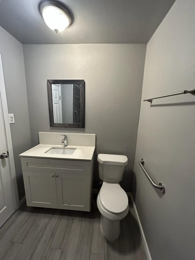 1108 Niagara St, Houston, TX 77051 - half bathroom featuring wood finished floors and vanity
