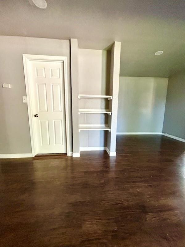 1108 Niagara St, Houston, TX 77051 - unfurnished room featuring baseboards and dark wood finished floors