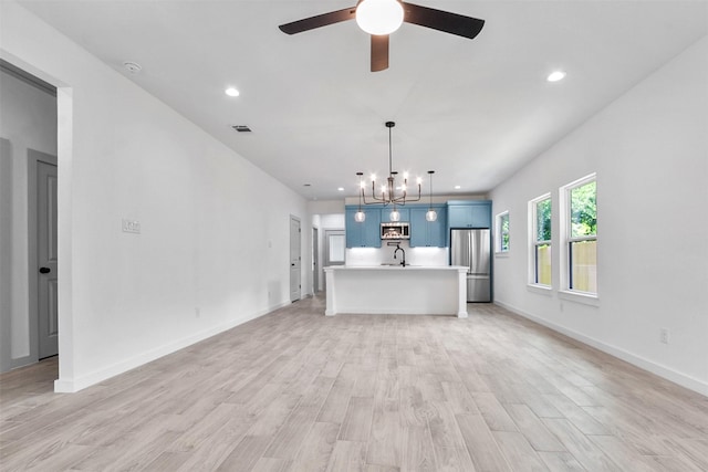 112 Whiteface Dr, Mabank, TX 75156 - unfurnished living room with a chandelier, light wood-type flooring, a ceiling fan, and recessed lighting