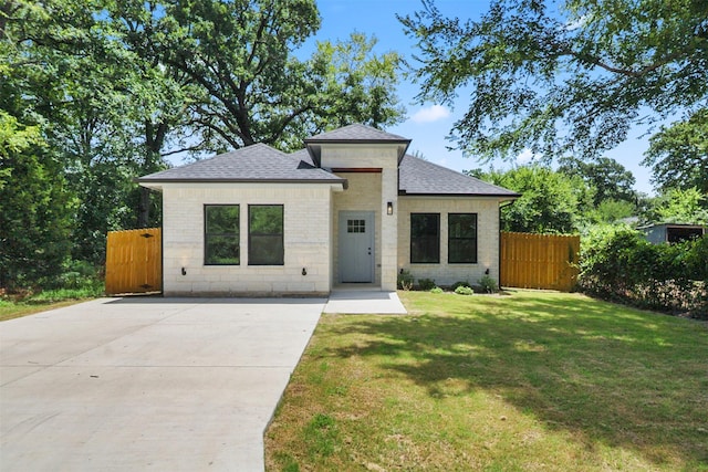 112 Whiteface Dr, Mabank, TX 75156 - view of front of property featuring a shingled roof, driveway, and brick siding