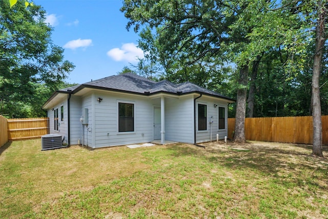 112 Whiteface Dr, Mabank, TX 75156 - rear view of property featuring a fenced backyard and a shingled roof