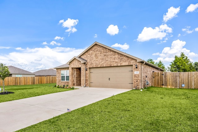 444 Maple Fawn Dr, Katy, TX 77493 - ranch-style house featuring driveway, a garage, and brick siding
