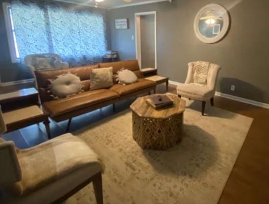160 E Darby St, Bridge City, TX 77611 - living area with baseboards and ceiling fan