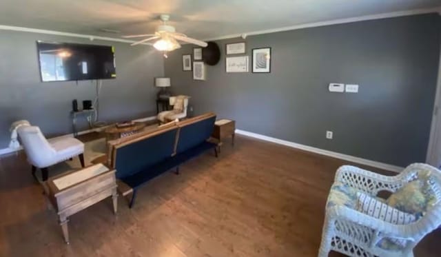 160 E Darby St, Bridge City, TX 77611 - living room with ceiling fan, wood finished floors, and crown molding