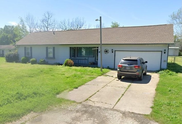 160 E Darby St, Bridge City, TX 77611 - single story home featuring driveway, a garage, and a front yard