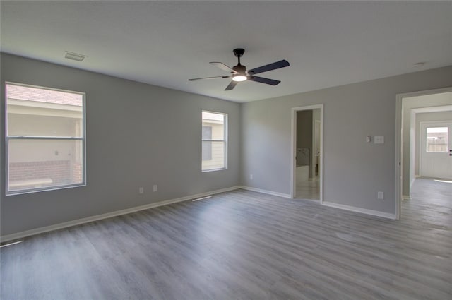 11623 Silent Elm St, Houston, TX 77044 - empty room featuring wood finished floors and a ceiling fan