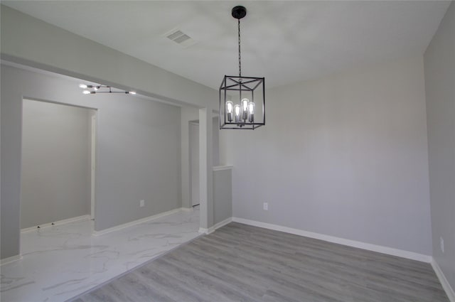 11623 Silent Elm St, Houston, TX 77044 - unfurnished dining area with a chandelier and baseboards