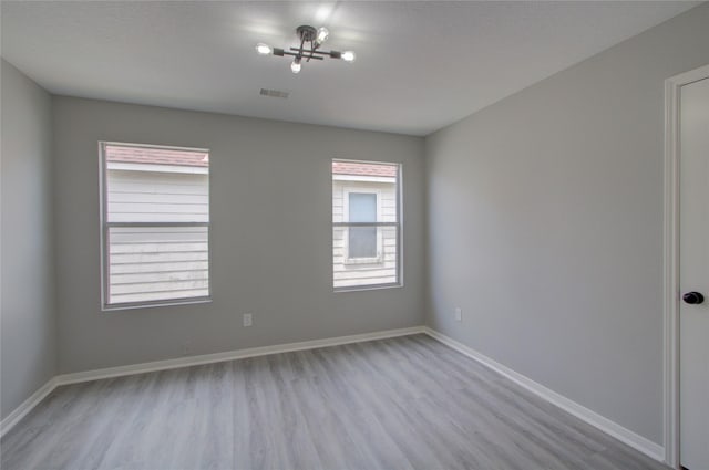 11623 Silent Elm St, Houston, TX 77044 - empty room with wood finished floors and baseboards
