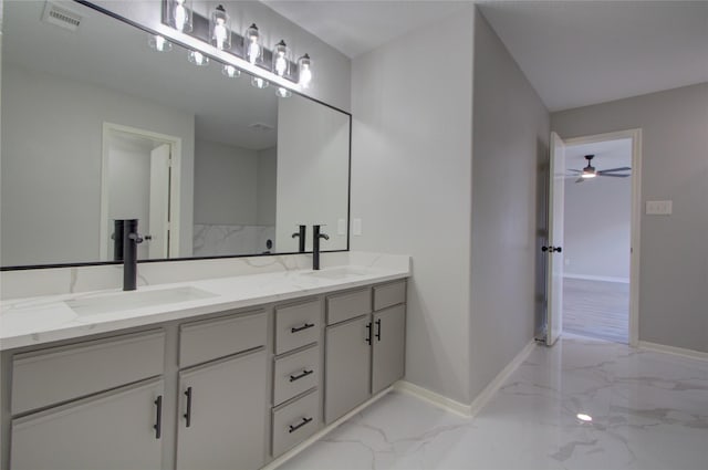 11623 Silent Elm St, Houston, TX 77044 - full bathroom with marble look tile flooring, double vanity, and a ceiling fan
