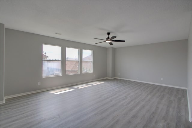 11623 Silent Elm St, Houston, TX 77044 - spare room featuring wood finished floors and ceiling fan