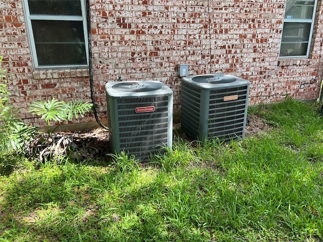 3709 Kettering Ave, Bay City, TX 77414 - exterior view of a central air condition unit and brick siding