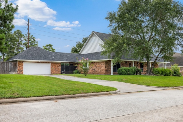 24418 Okehampton Dr, Tomball, TX 77375 - view of front of property featuring brick siding, an attached garage, and driveway