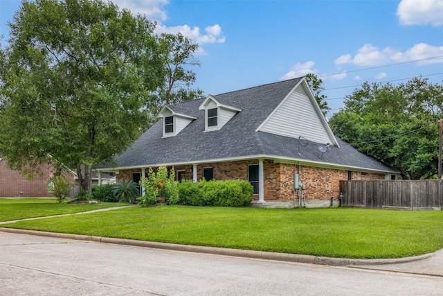 24418 Okehampton Dr, Tomball, TX 77375 - new england style home with brick siding and a shingled roof