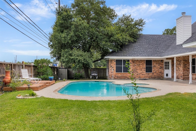24418 Okehampton Dr, Tomball, TX 77375 - view of swimming pool featuring a fenced backyard, a grill, and a patio area