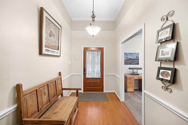 24418 Okehampton Dr, Tomball, TX 77375 - foyer with ornamental molding and light wood-style floors