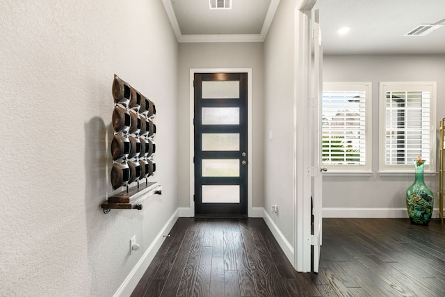 27688 Vivace Dr, Spring, TX 77386 - foyer entrance with crown molding and dark wood-style floors